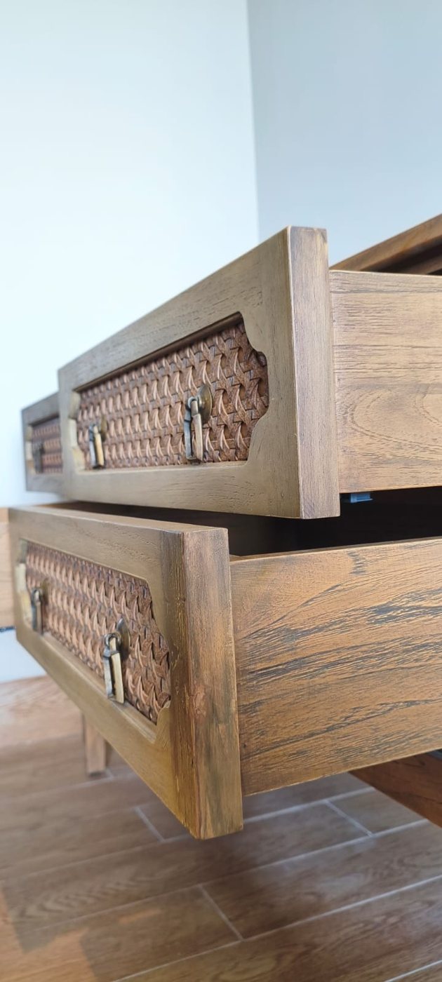 Teak drawer unit with carved panel fronts