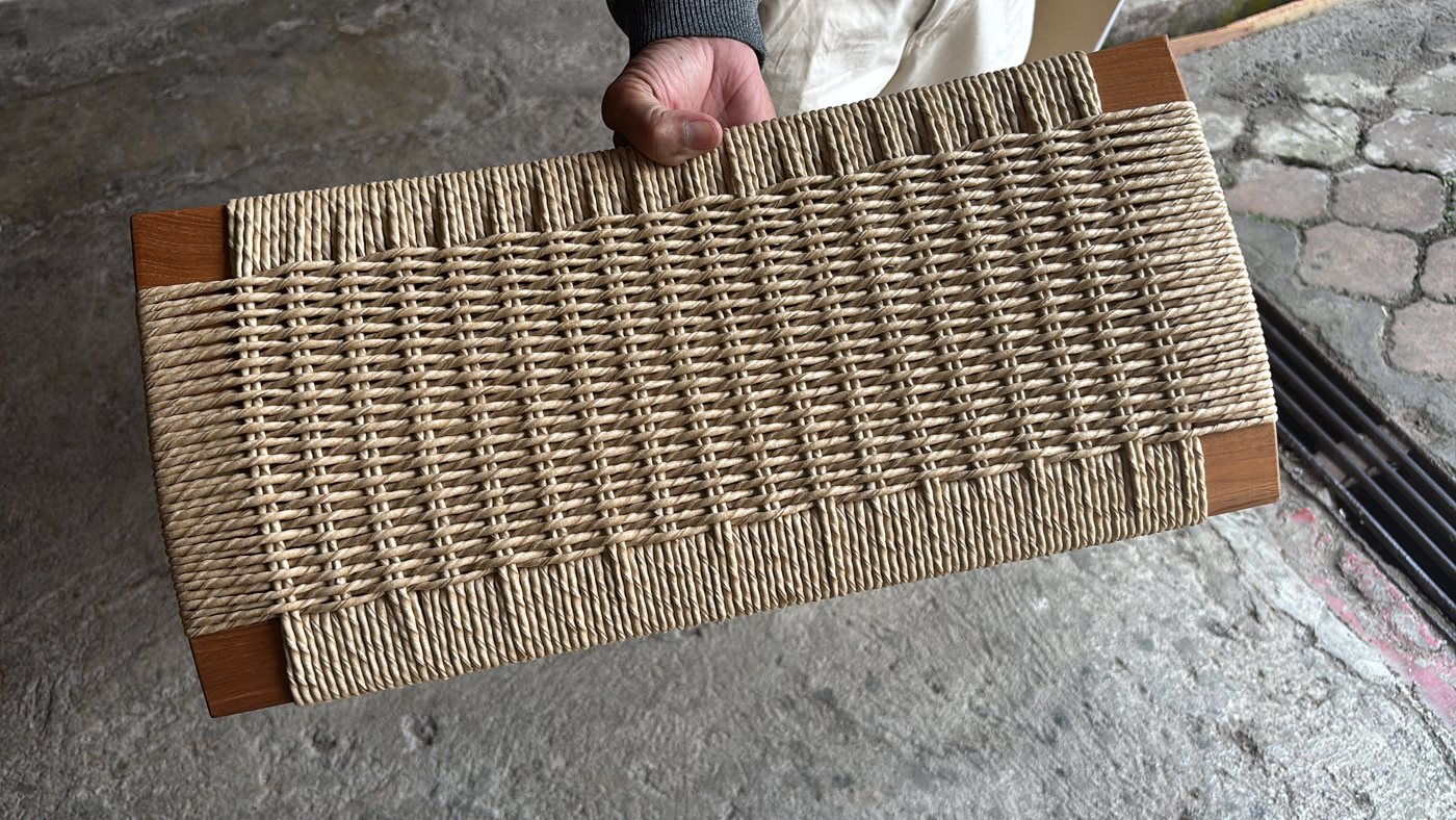 Rope-woven seat panel with timber corners