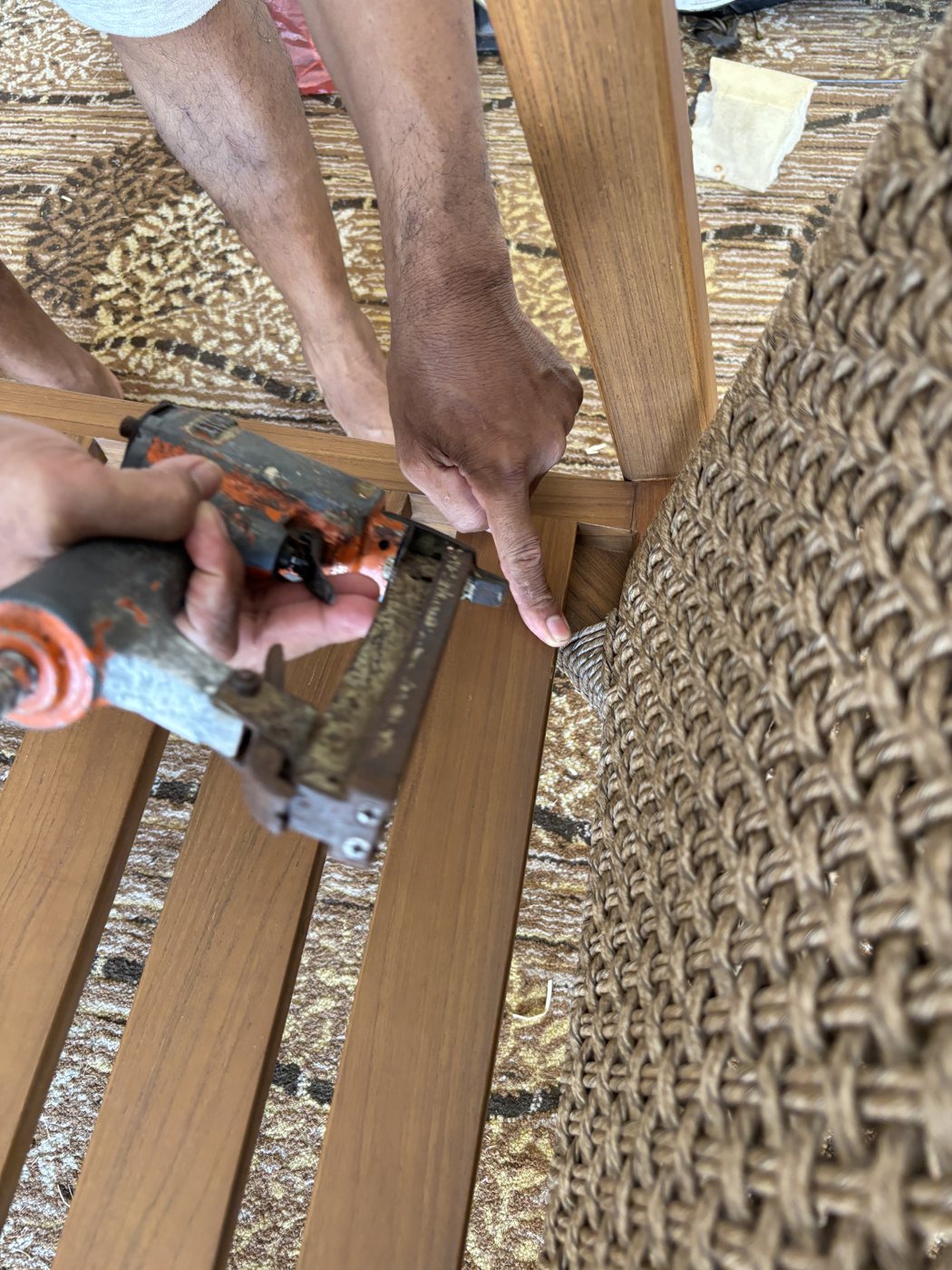Fixing a woven panel to its timber frame