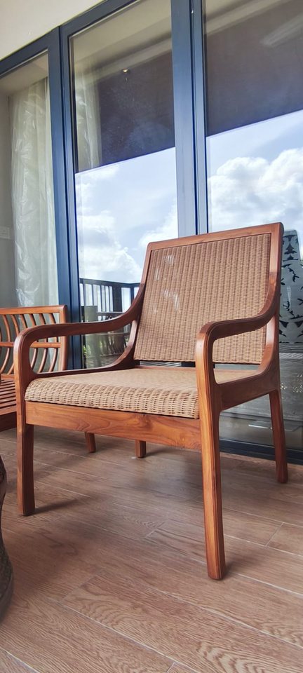 Woven-seat armchair in solid hardwood