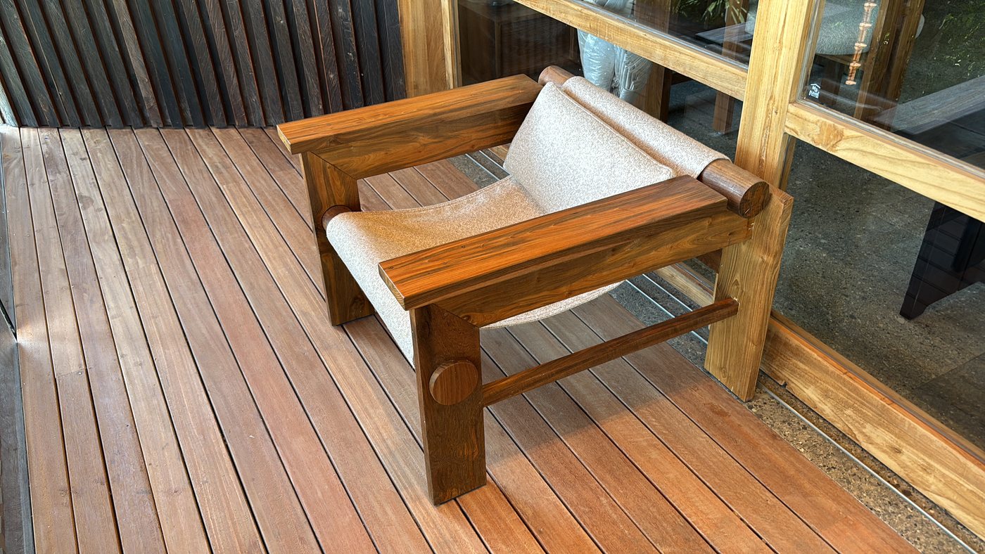 Solid teak lounge chair on the deck