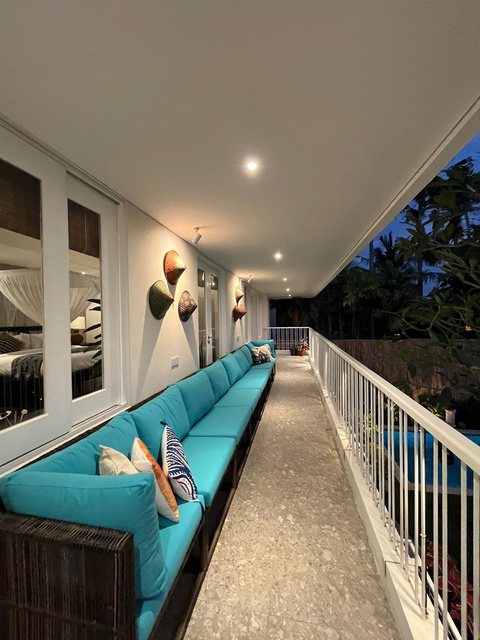 Long terrace sofa with woven base