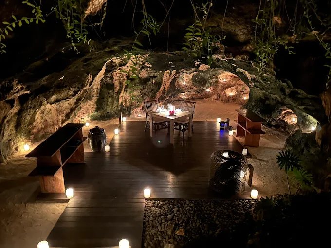 Lighting scheme for an outdoor dining grotto